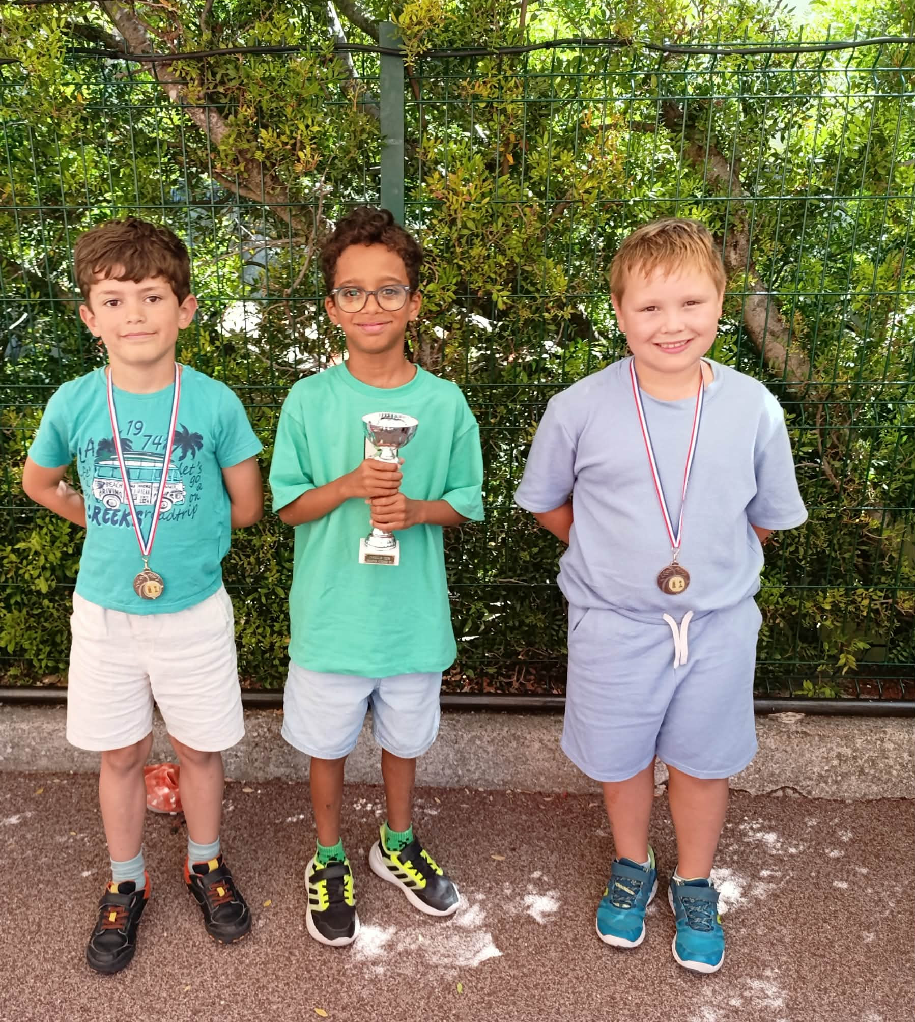 Championnat CE1 Théoule 2026 de g à d : Alix - Aaron - Léo